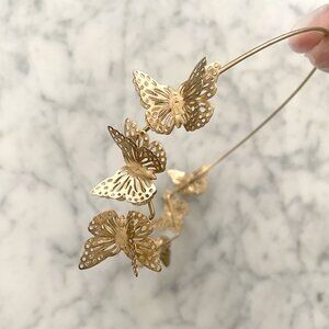 Urban Outfitters vintage gold metallic butterfly hairband